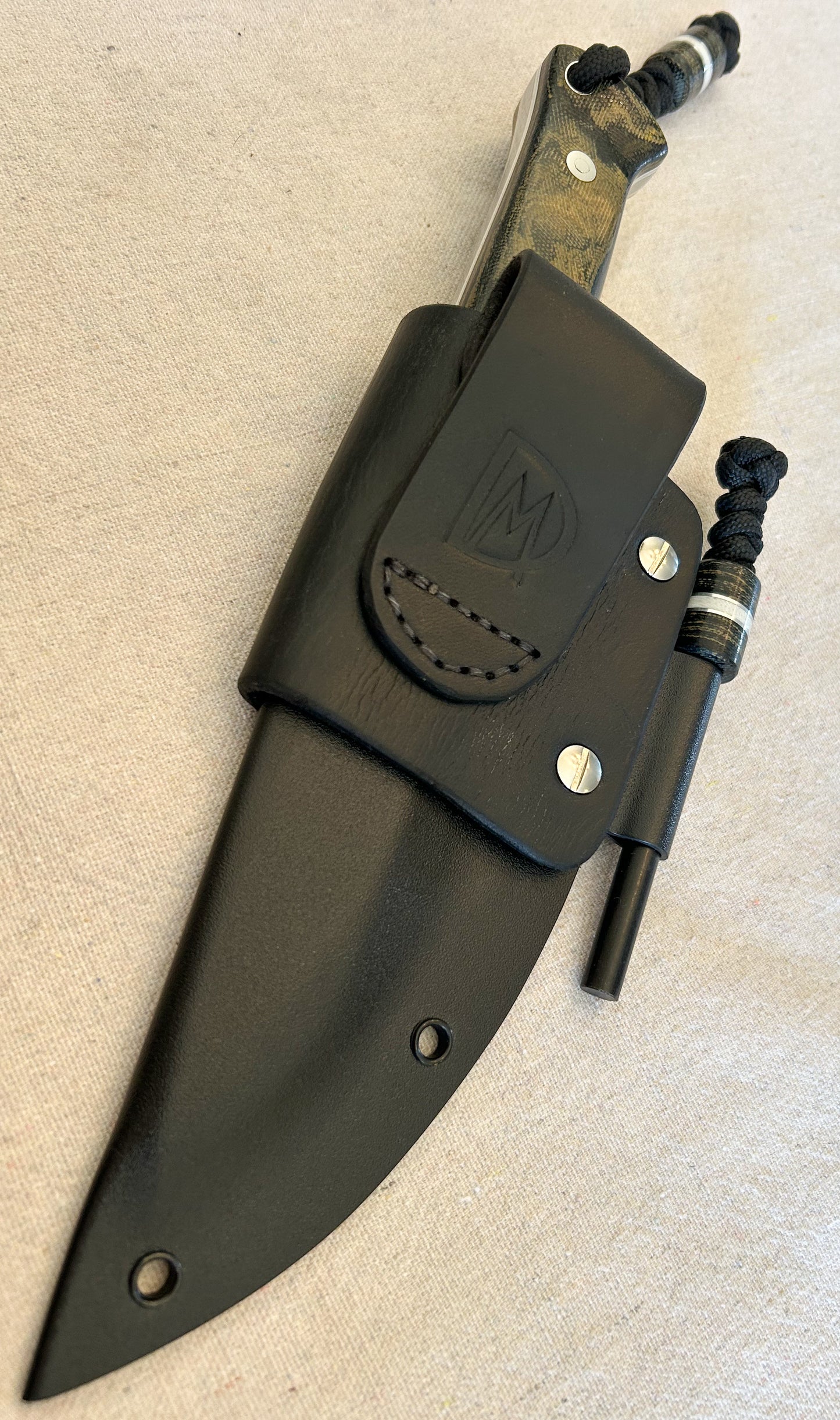Endure bushcrafter in camo micarta with white G10 and aluminum liners