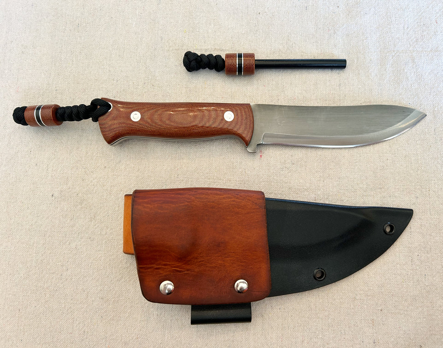 Endure bushcrafter in natural micarta with black G10 and thick aluminum liners