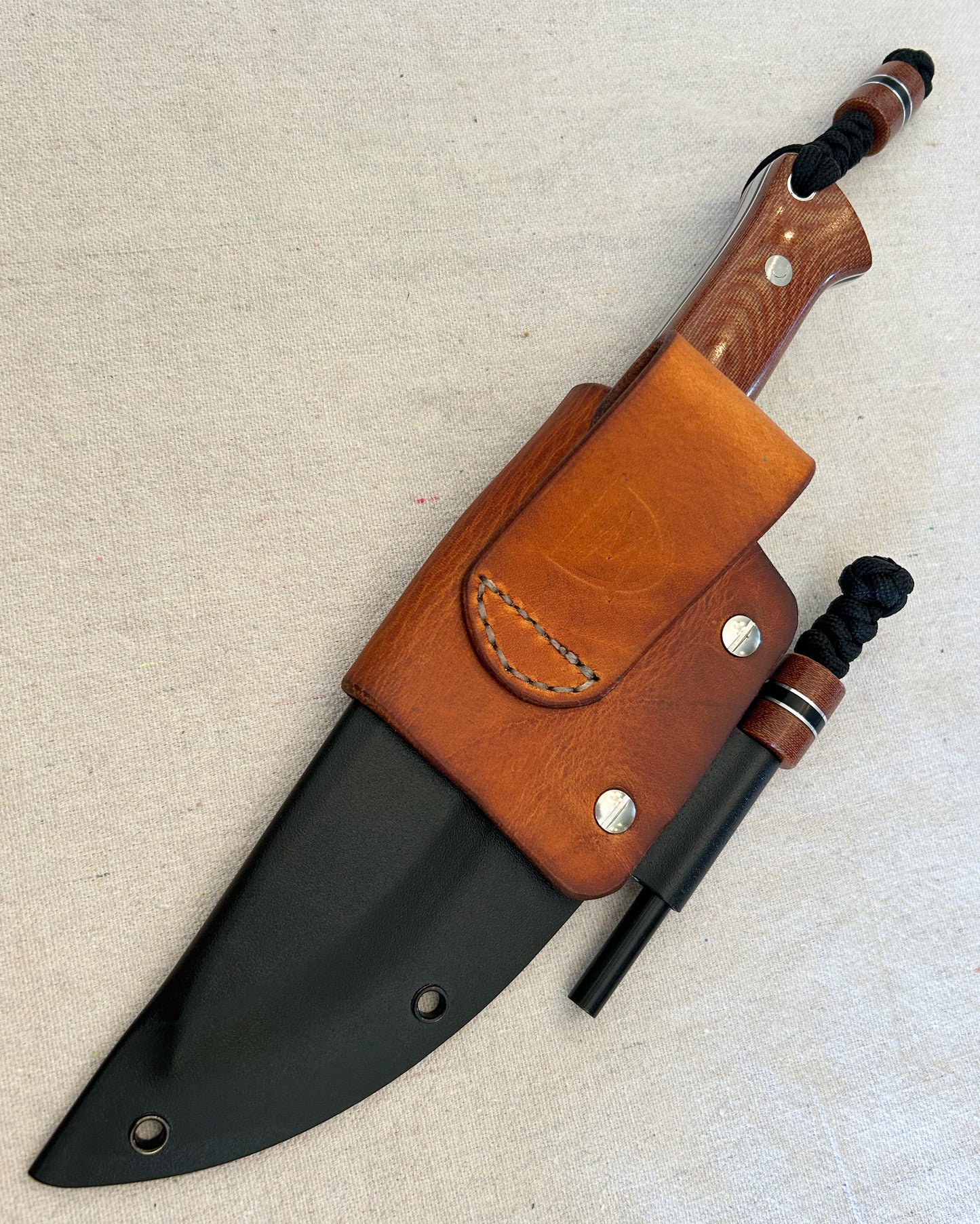 Endure bushcrafter in natural micarta with black G10 and thick aluminum liners
