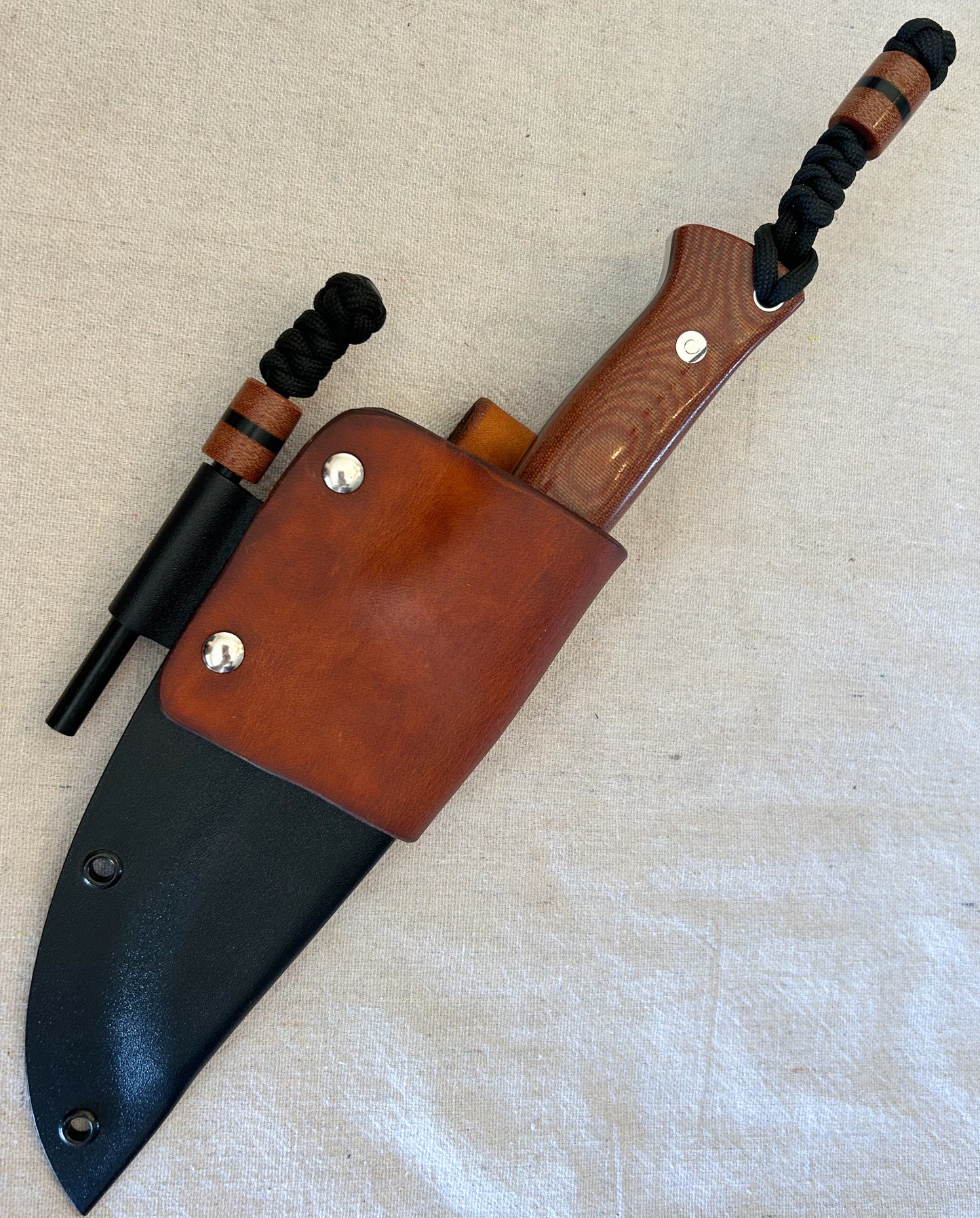 Endure bushcrafter with natural canvas micarta with black G10 liners