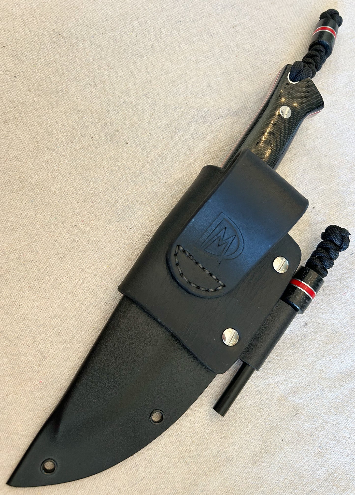 Endure bushcrafter with black canvas micarta and Thick red G10 liners
