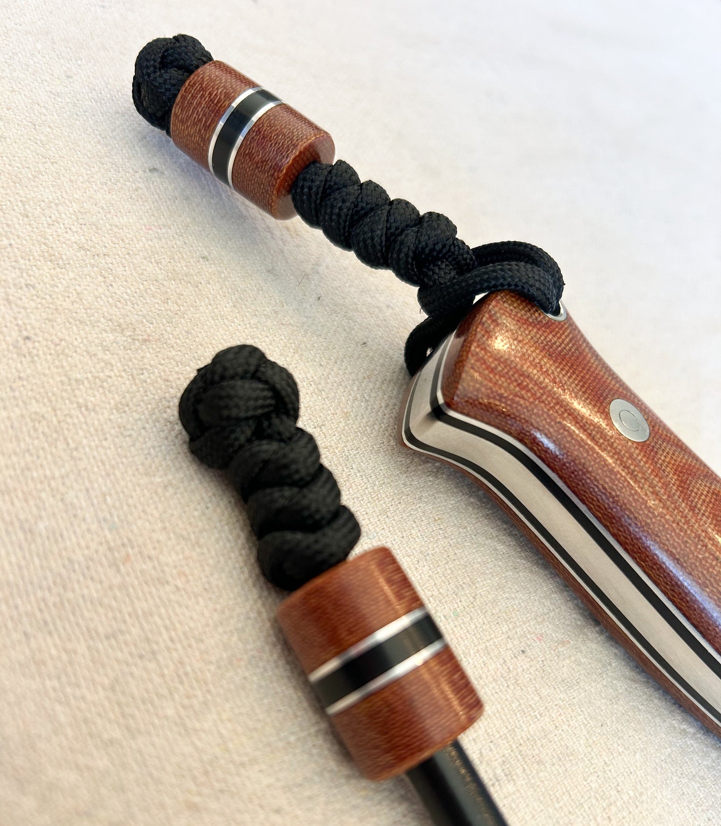 Endure bushcrafter in natural micarta with black G10 and thick aluminum liners