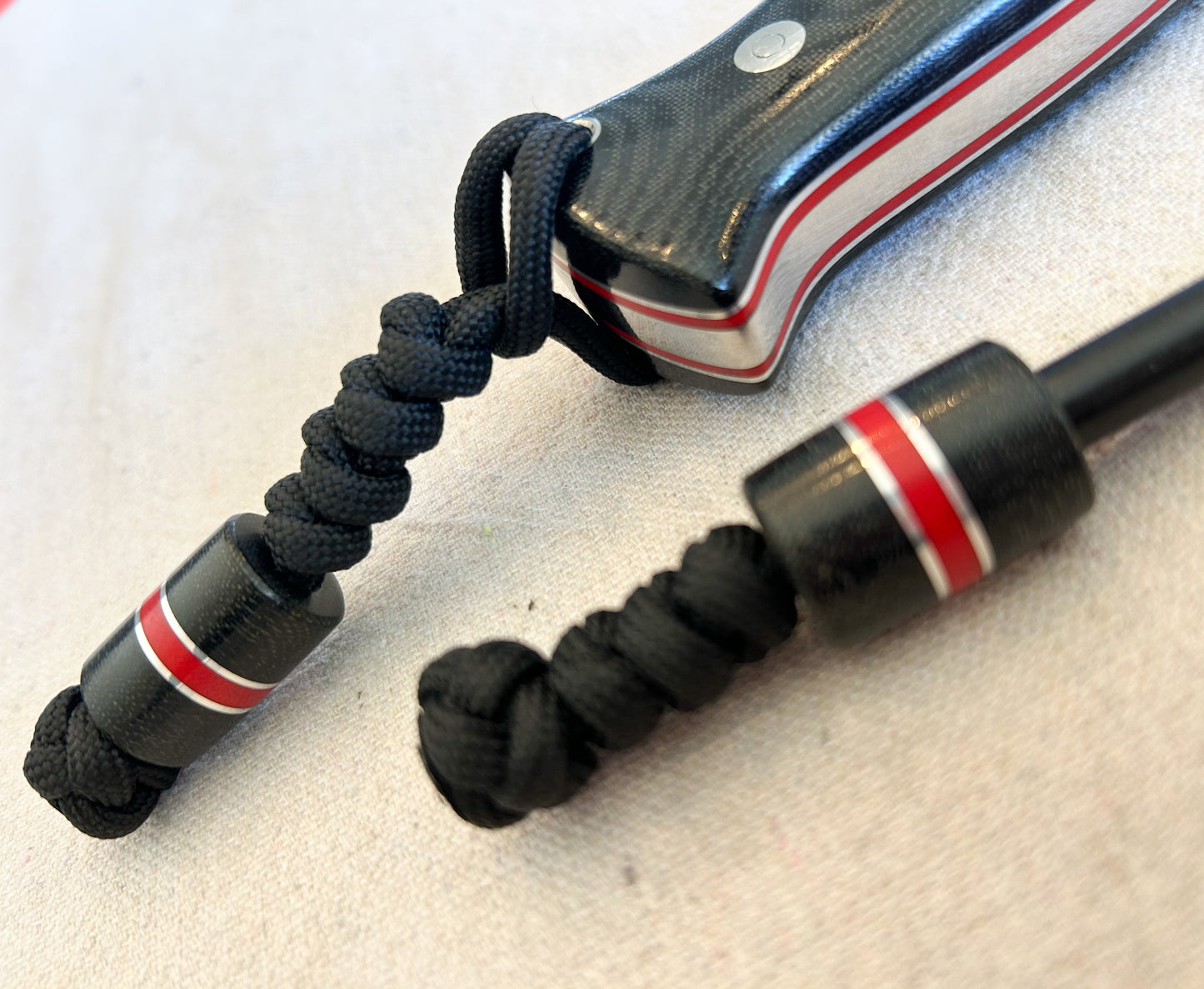 Endure bushcrafter with black canvas micarta and Thick red G10 liners