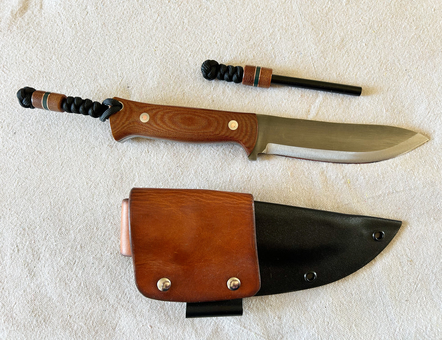 Endure bushcrafter with natural canvas micarta with copper and forest green G10 liners and copper loveless bolts
