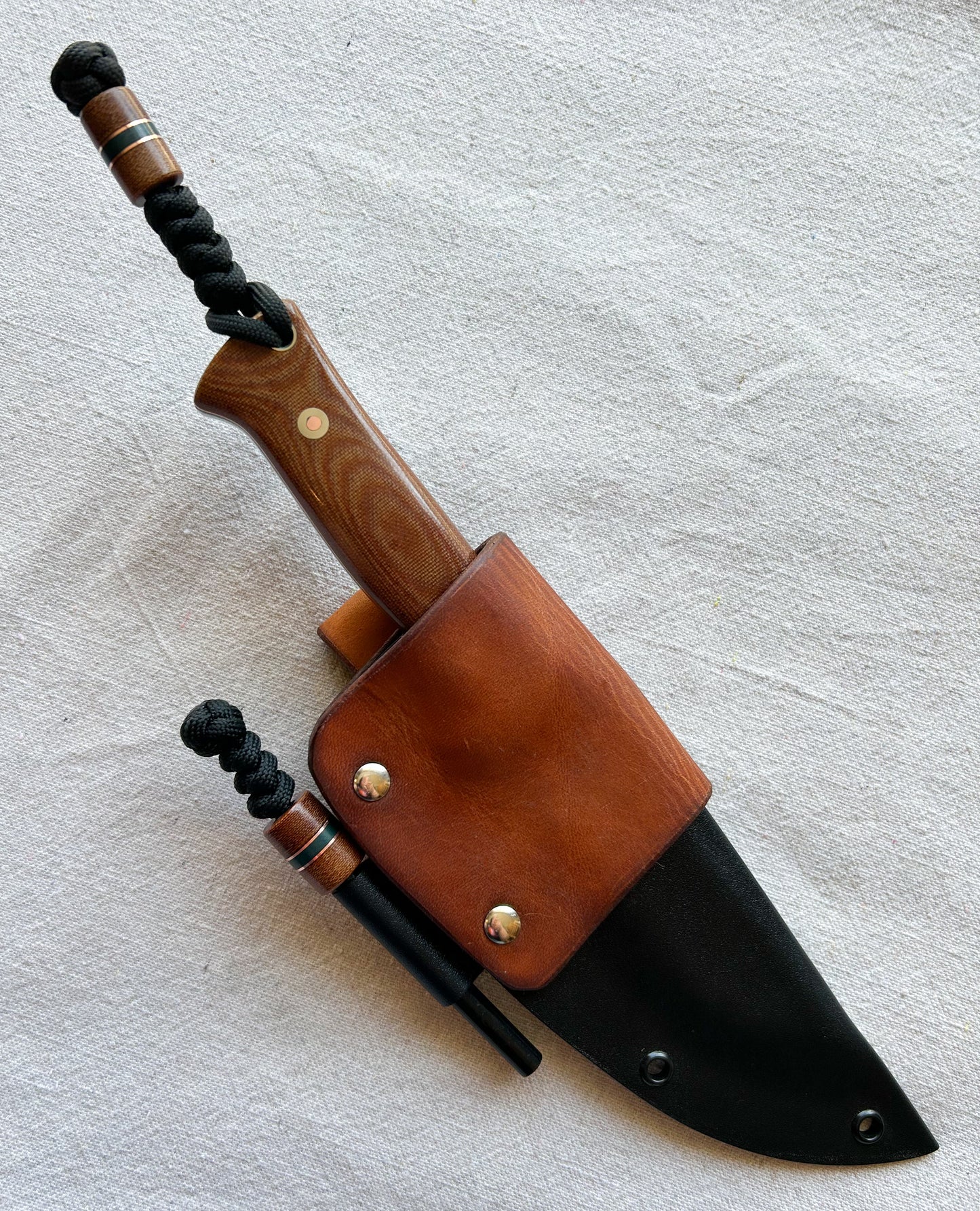 Endure bushcrafter with natural canvas micarta with copper and forest green G10 liners and copper loveless bolts