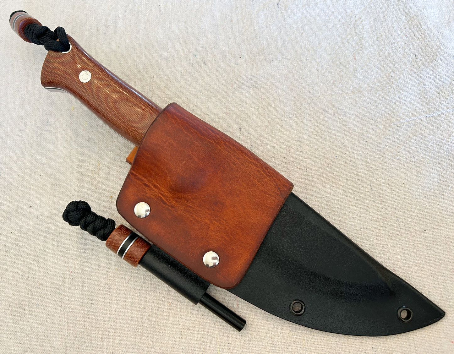 Endure bushcrafter in natural micarta with black G10 and thick aluminum liners
