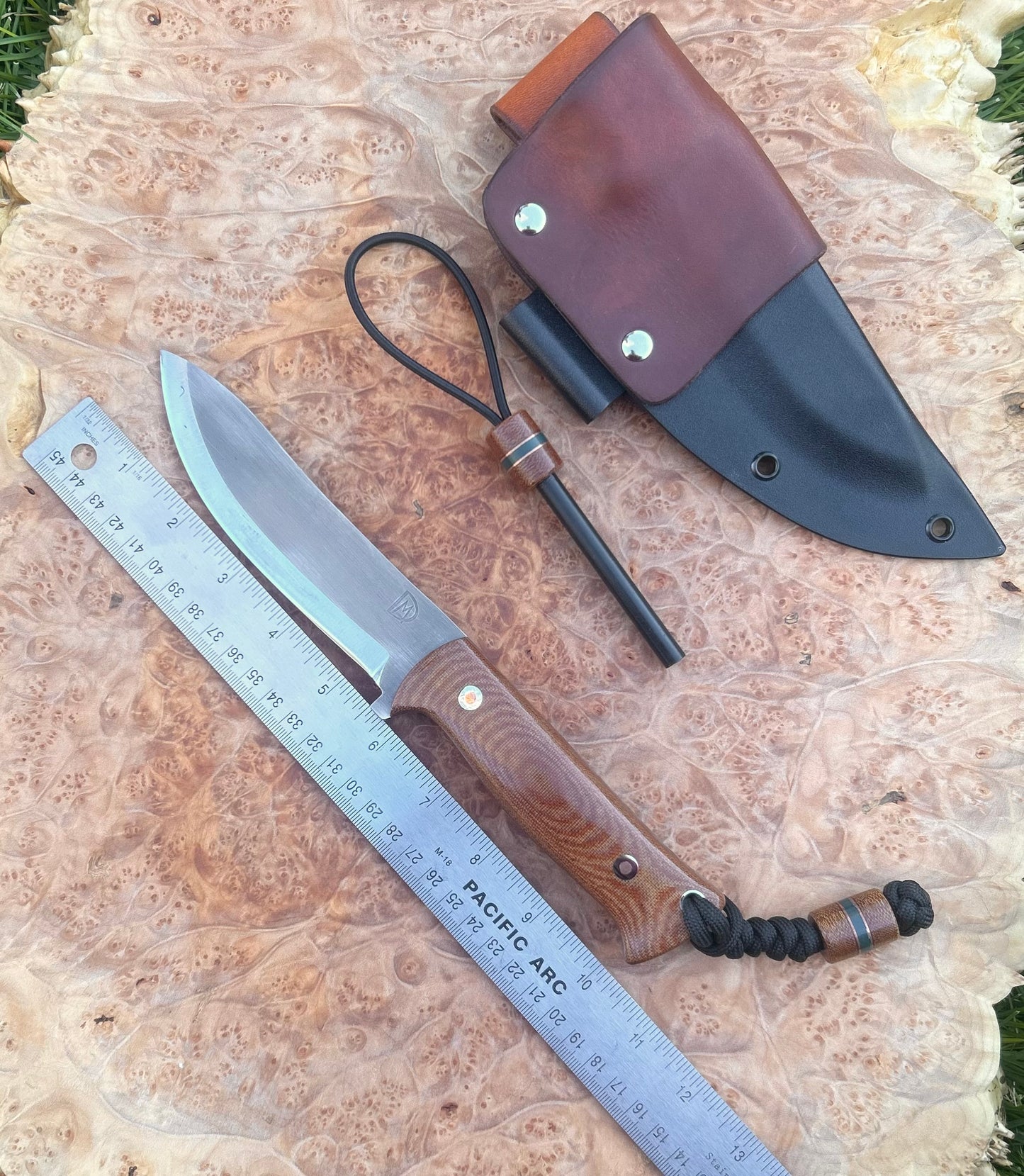 Endure Bushcrafter (natural canvas micarta with copper and forest green G10 liners, copper Loveless bolts)